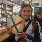 Abby Lampe poses in a nearby pub.
