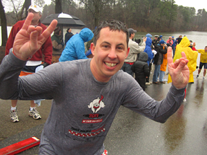Guy making Wolfpack sign after plunge.