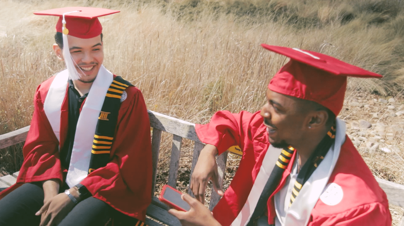 Jean Ferman and Gabriel Montague talk on a bench outside of Hunt Library.