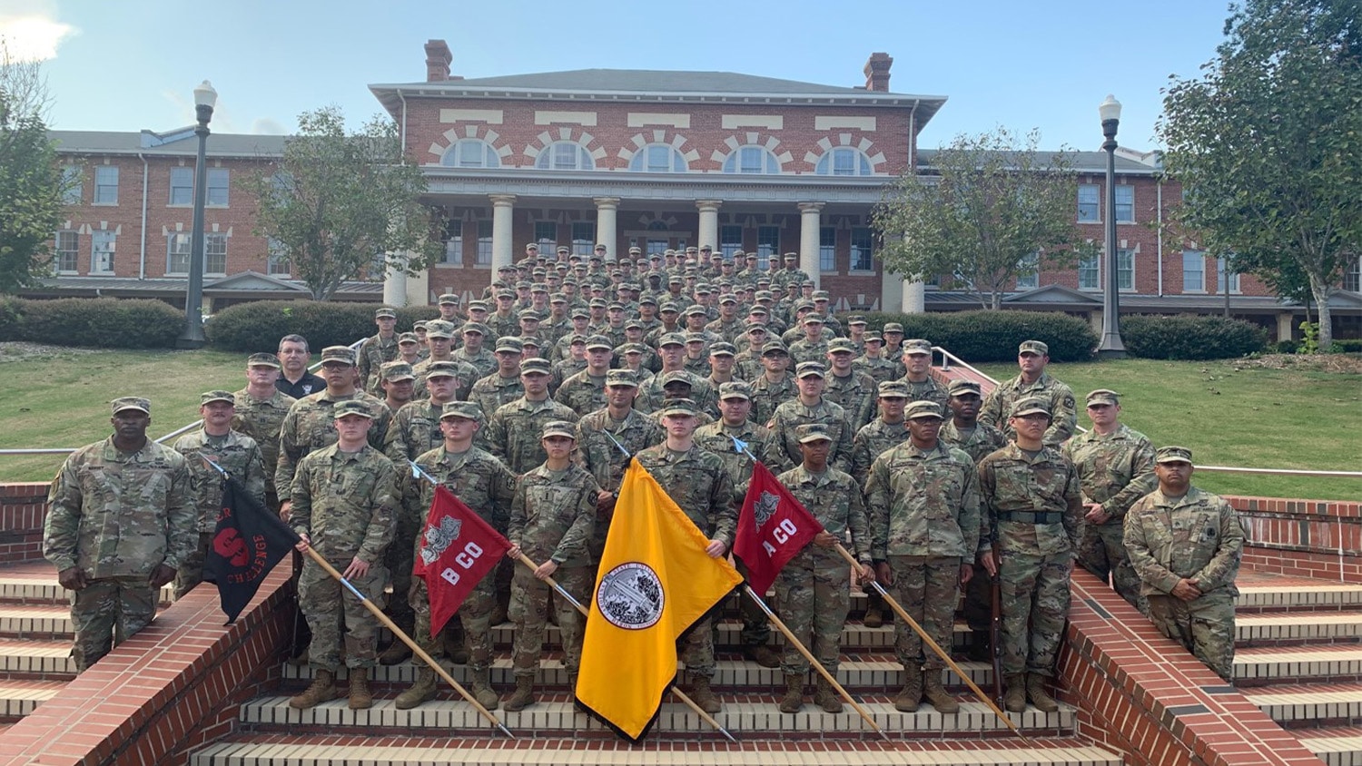 Group of Army ROTC cadets in uniform on the steps leading down to the Court of North Carolina