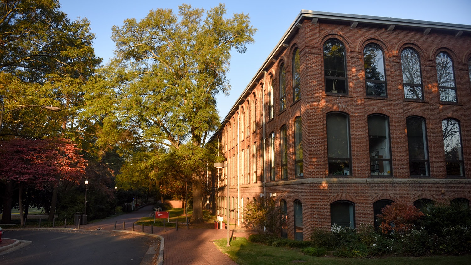 brick building next to trees