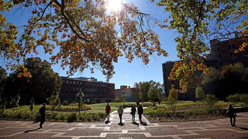 年代tudents walk to class on North Campus at the Brickyard, near the space where Harrelson Hall once stood.
