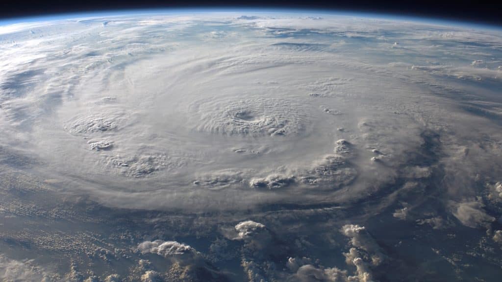 An aerial photo shows a hurricane forming on one of Earth's oceans