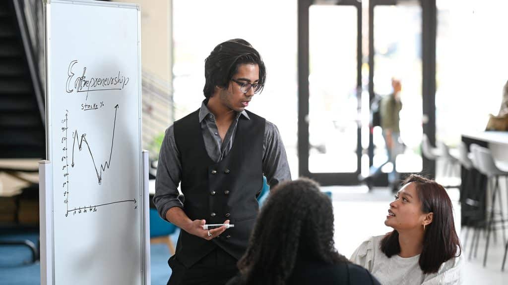 Students work in the Entrepreneurship Clinic on Centennial Campus.