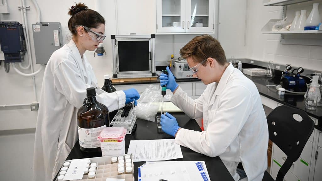 Students work with samples in the hydraulics lab in Fitts-Woolard Hall on Centennial Campus.