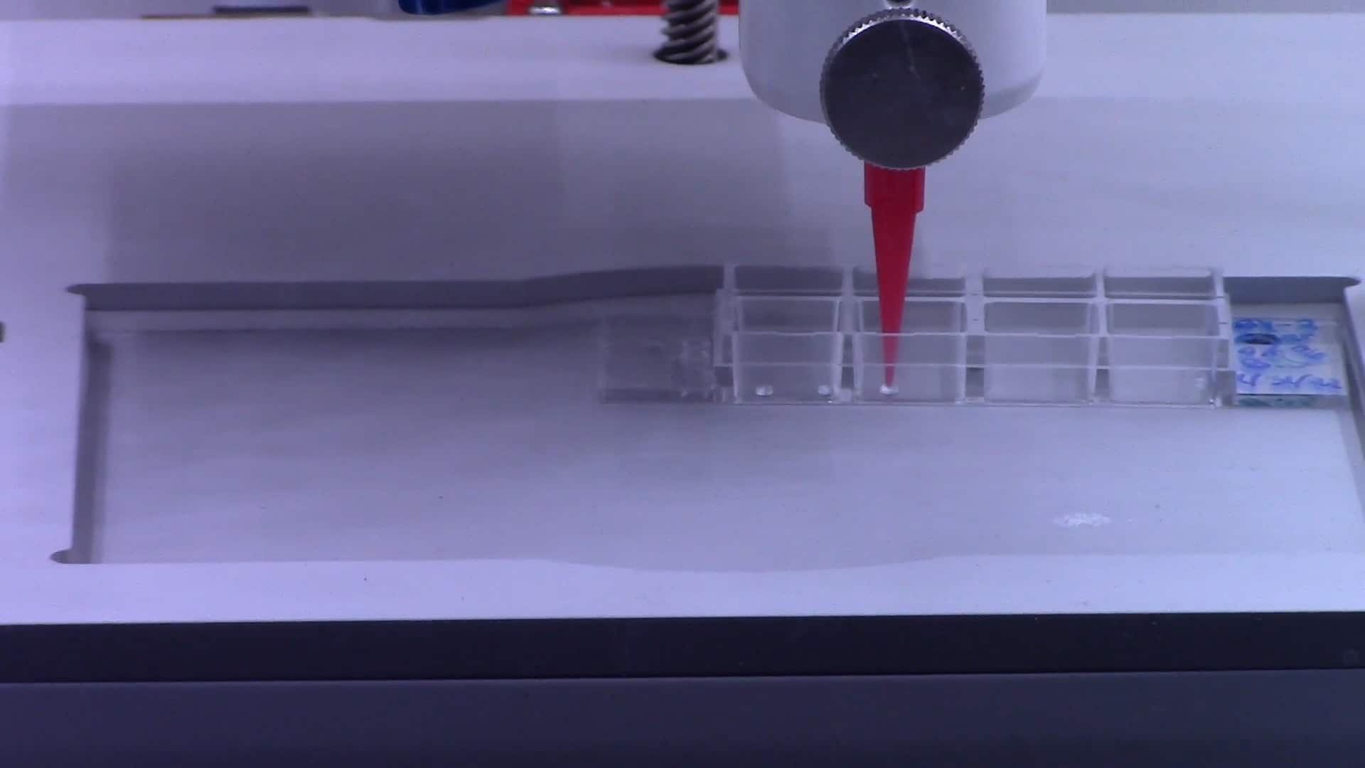 Photo of 3D printer bioprinting plant cells.