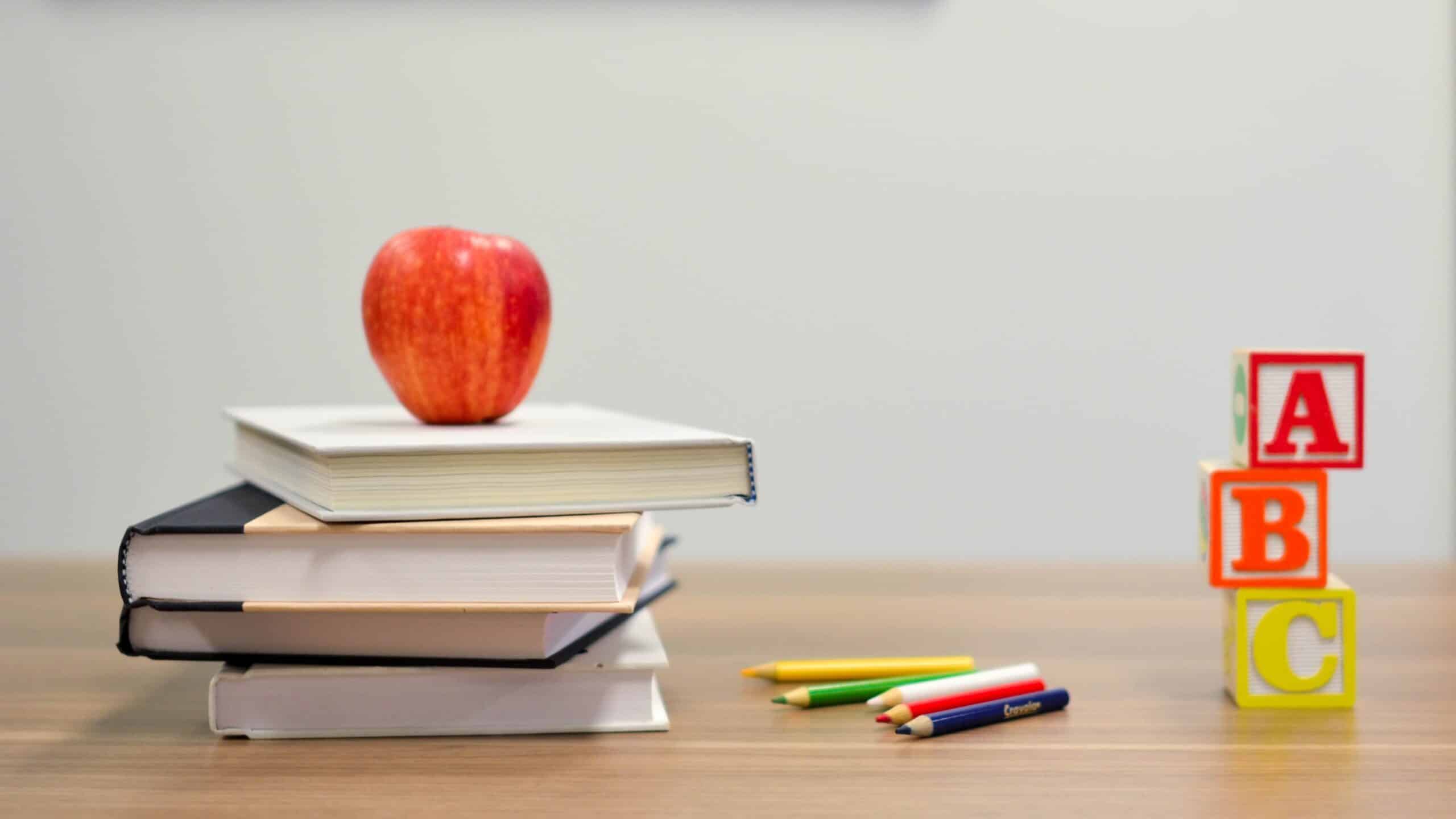 Apple on school books.