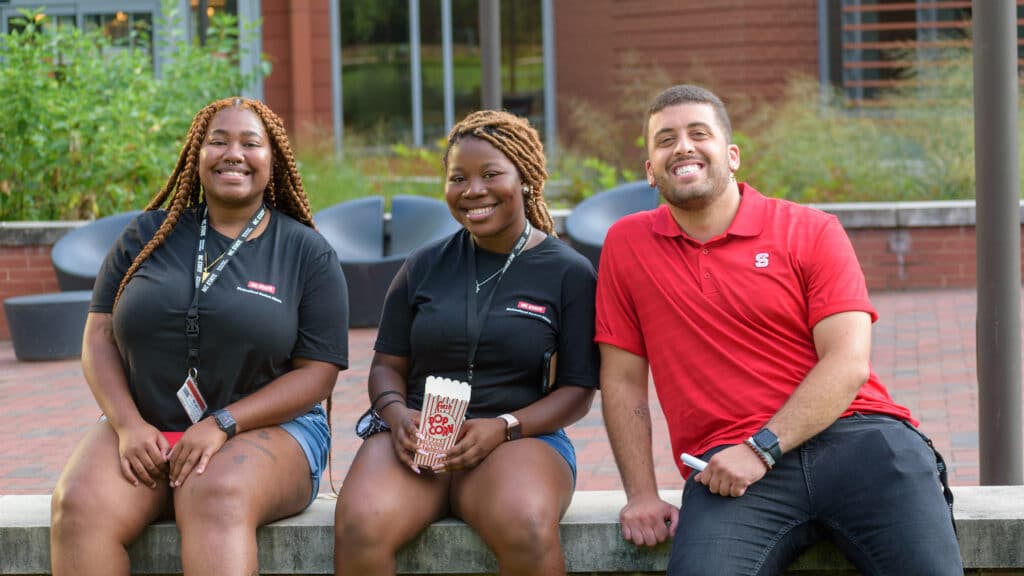 Student mentors sit with Gavin Bell, assistant director of Multicultural Student Affairs.