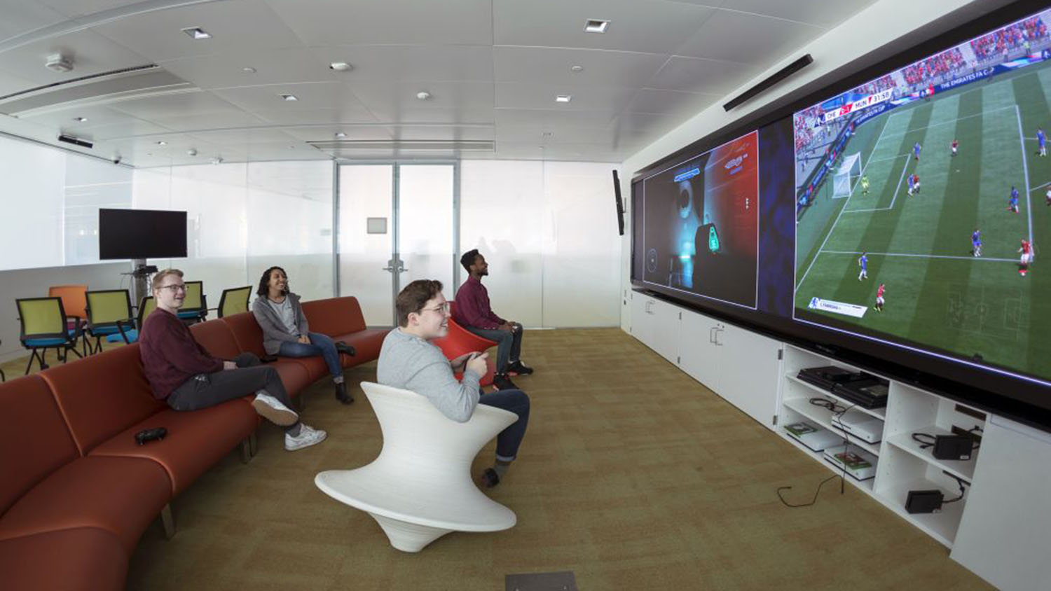 Students play video games alongside each other in Hunt Library's Game Lab.