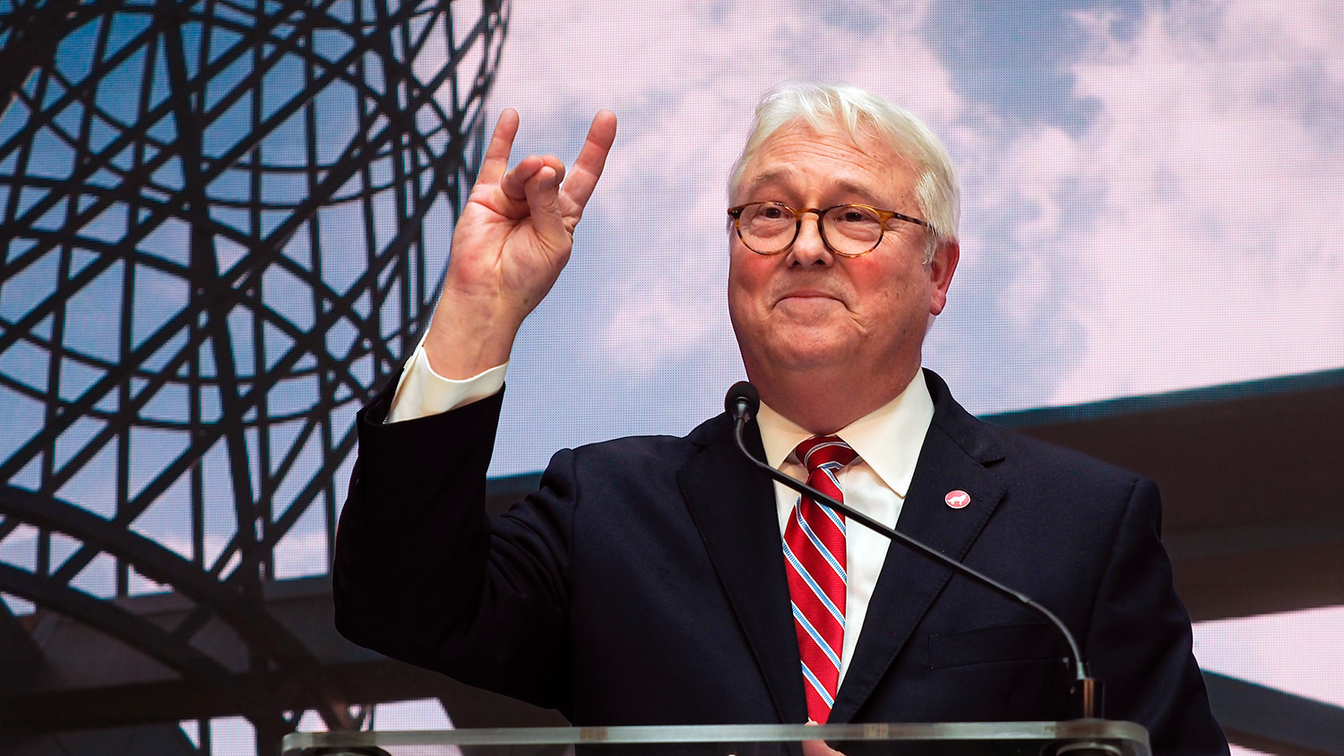 NC State Chancellor Randy Woodson throws up a 